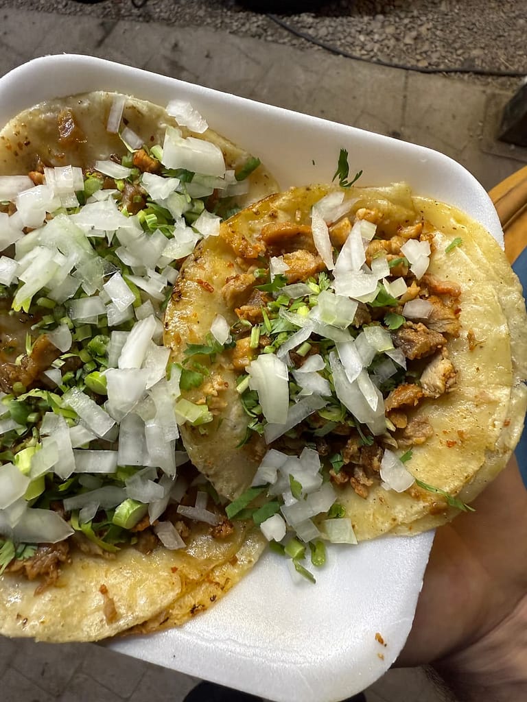 3 tacos on a to go plate from tacos yeyo in the park